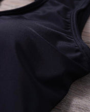 THE “LOOK-BACK” WETSUIT