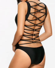 THE “LOOK-BACK” WETSUIT